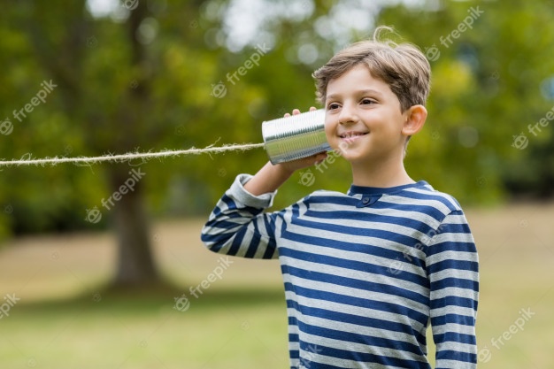 boy-listening-through-tin-can-phone_107420-35221.jpg