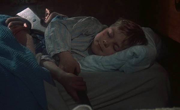 ralphie-sleeping-with-gun.jpg