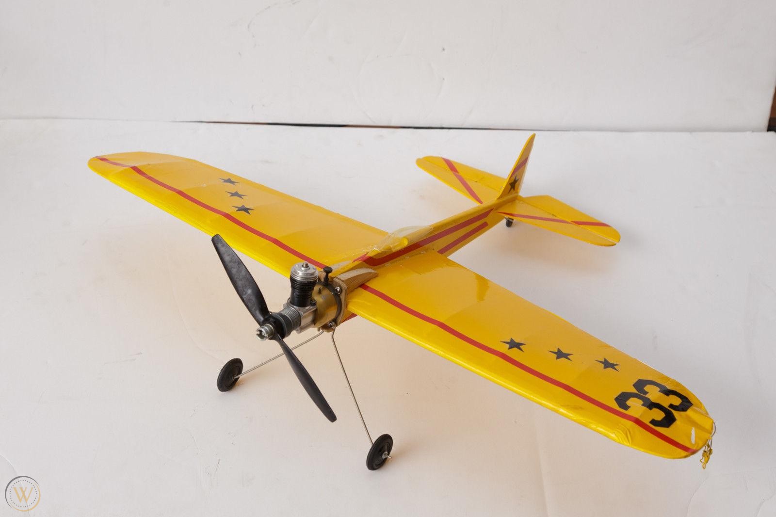 yellow-vintage-control-line-airplane_1_8926a79dab13e2f3bc6d02fba390cc98.jpg